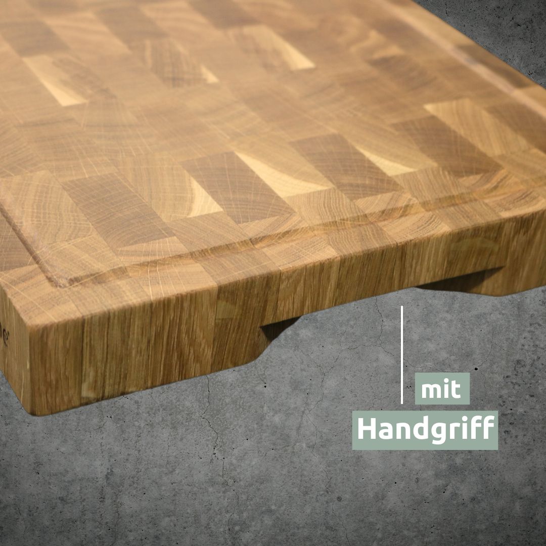 Hoek van de eikenhouten kopshoutplank met uitgefreesde handgreepuitsparing