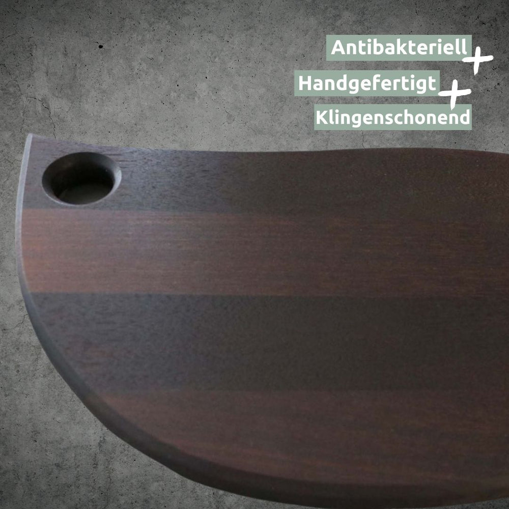 Hoek van de donkere keukenplank, antibacterieel, handgemaakt en mesvriendelijk
