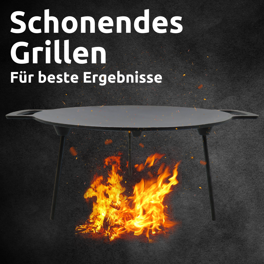 Gietijzeren grillplaat op driepoot boven open vuur bij zacht grillen