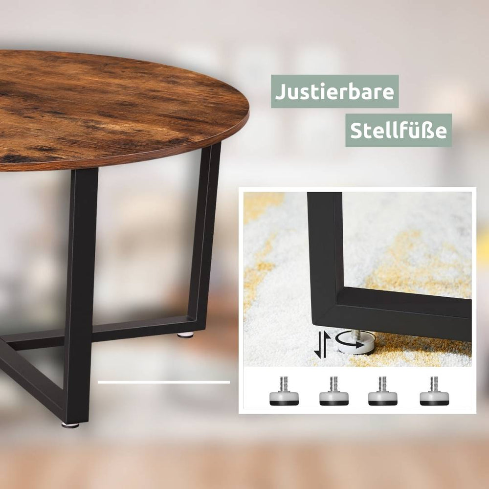 Verstelbare stelvoetjes aan het zwarte metalen onderstel van de salontafel Indie