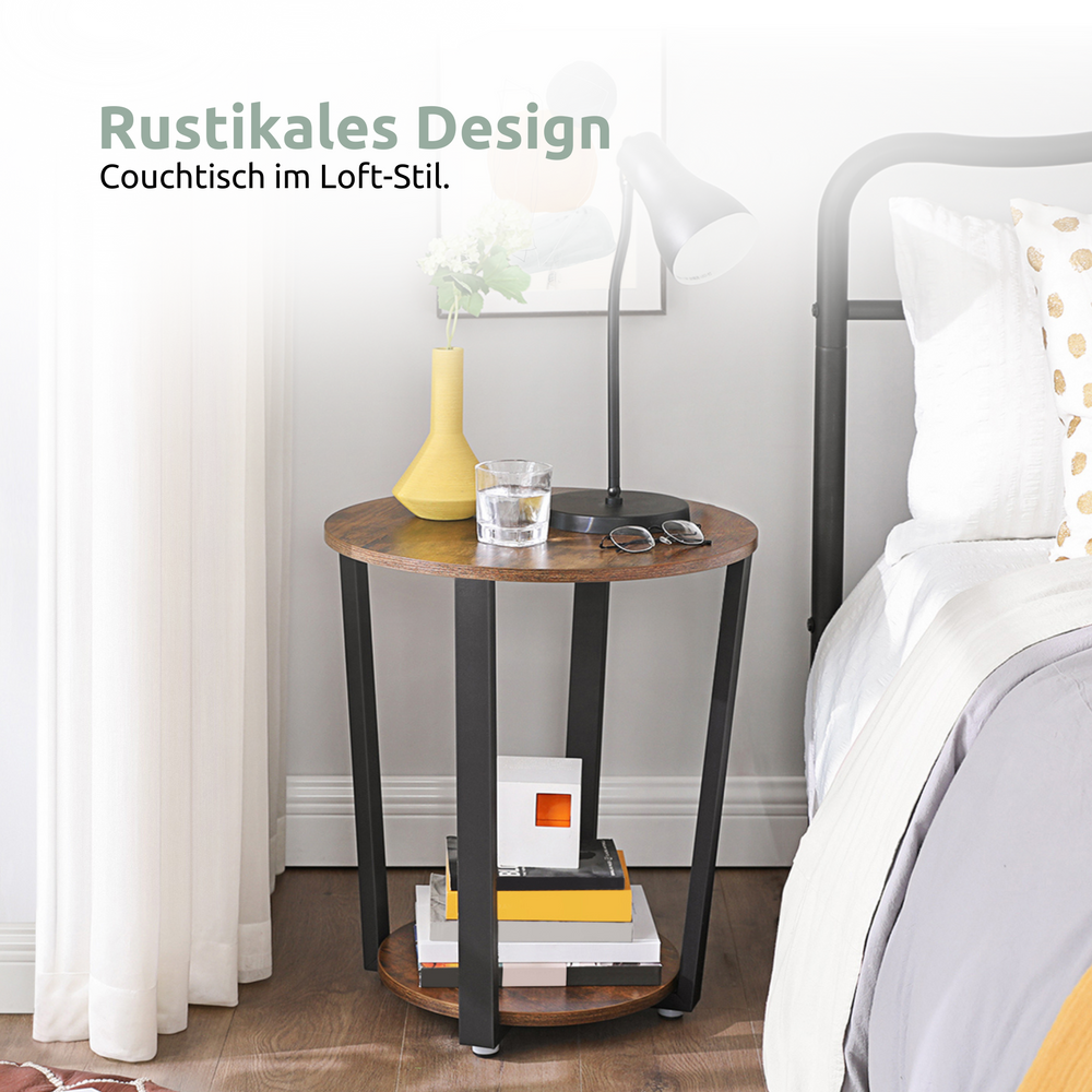 Ronde bijzettafel Lorie in loftstijl naast het bed met leeslamp en decoratie
