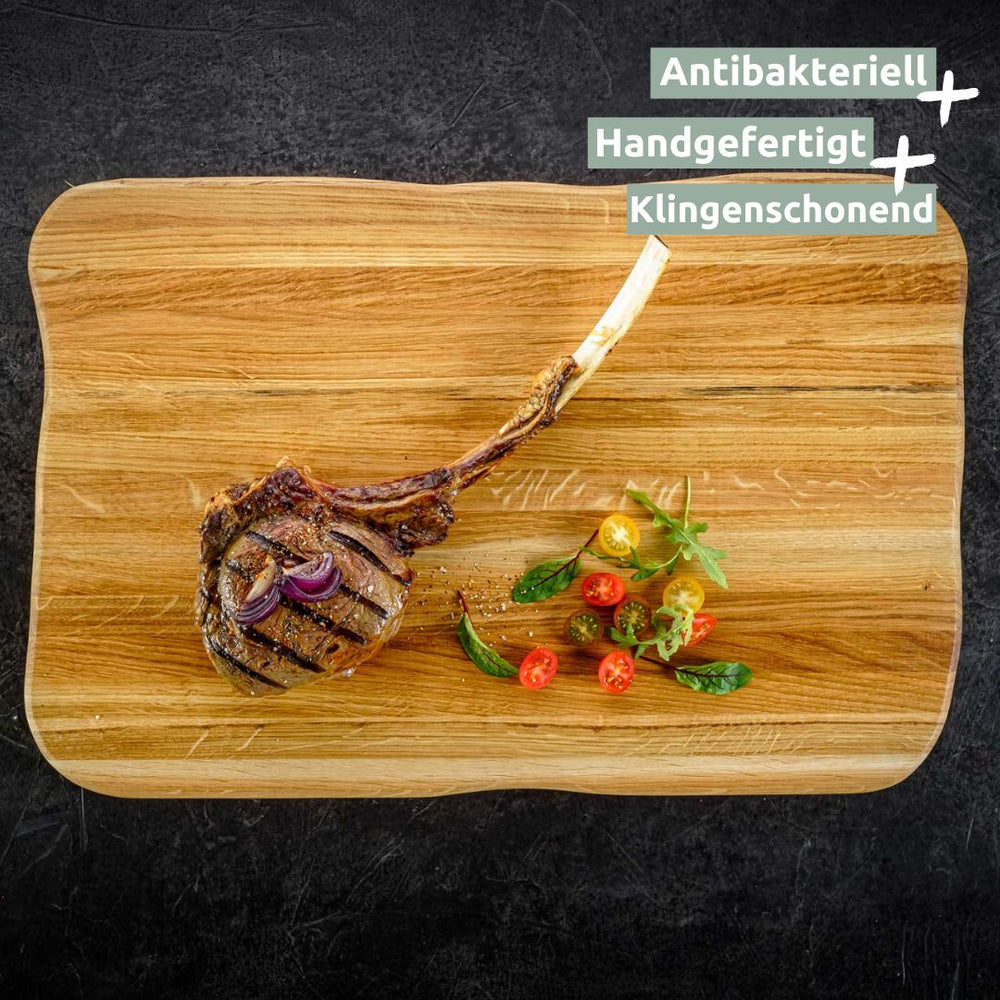 Gegrilde tomahawksteak op lichte eikenhouten steakplank Master, handgemaakt en mesvriendelijk