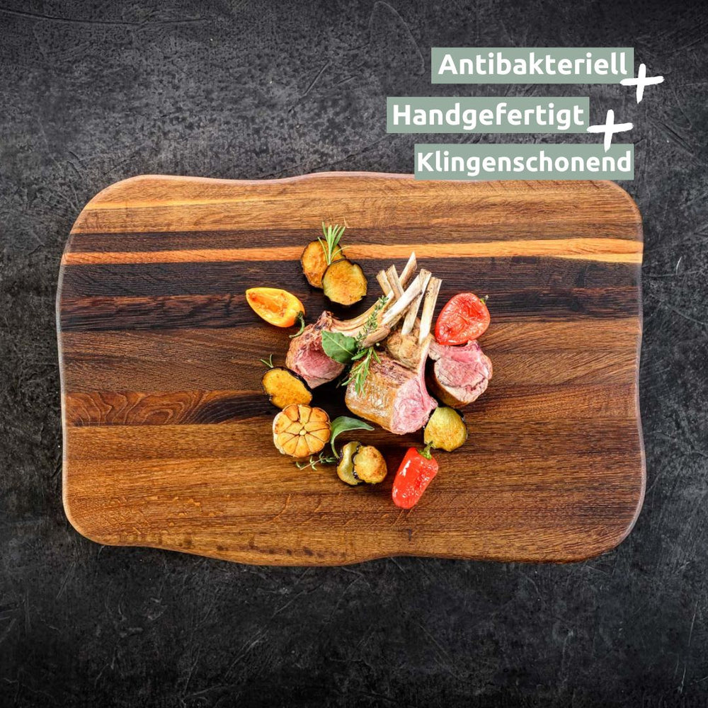Infografiek antibacterieel, handgemaakt, mesvriendelijk bij de eikenhouten steakplank met lamskoteletten